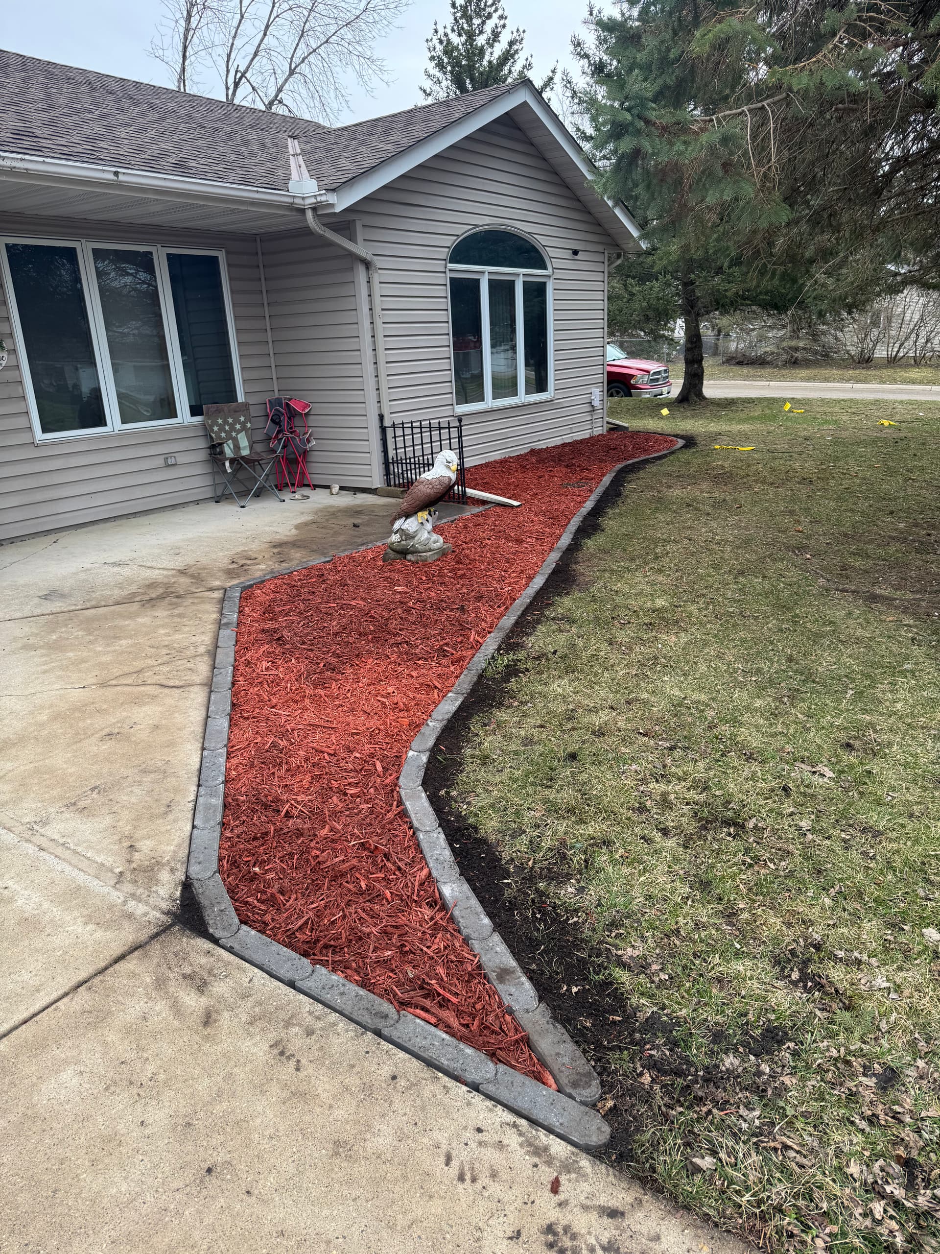 River Rock Removal and Fresh Mulch Bed Upgrade image