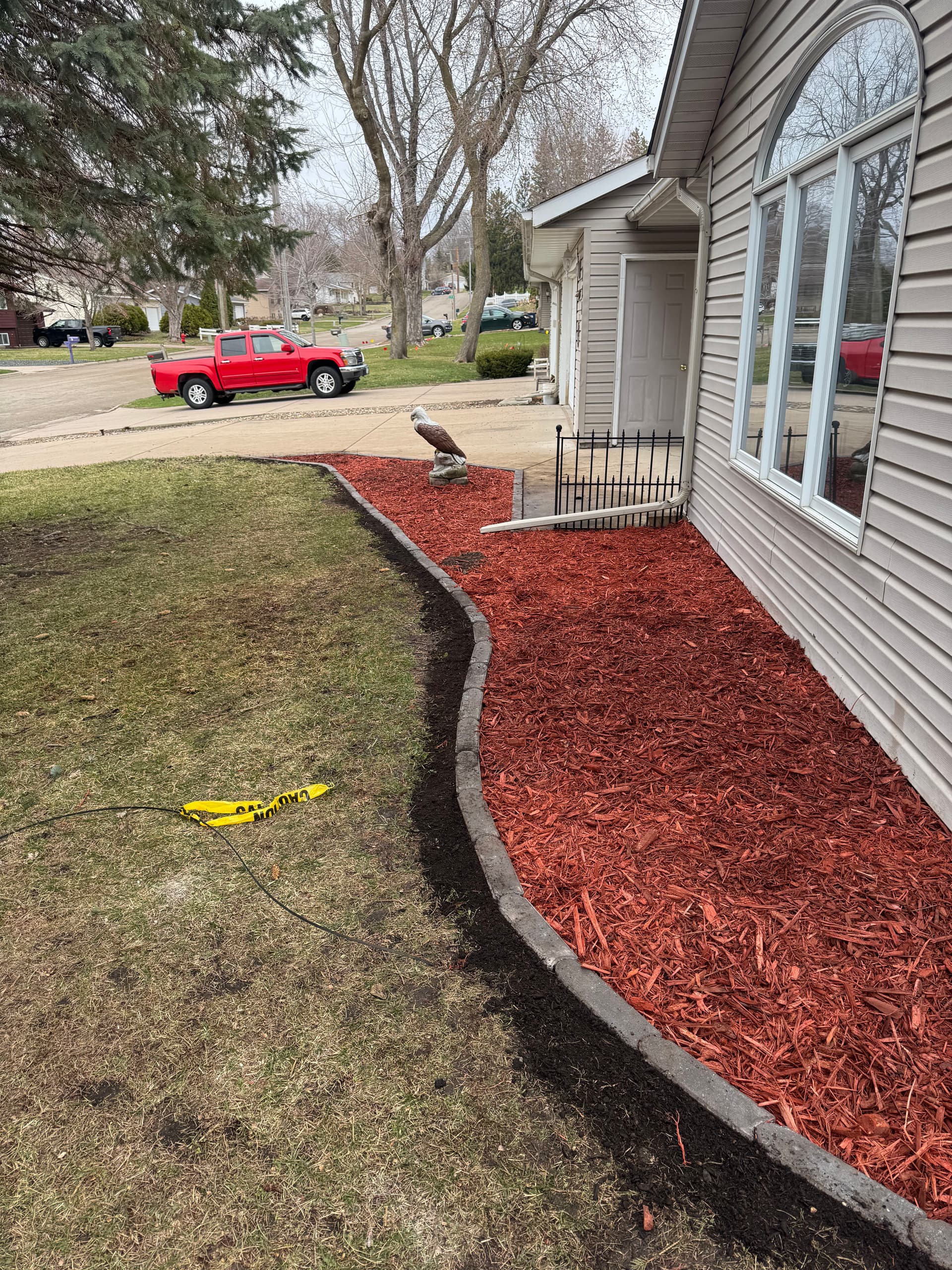 Gallery photos for River Rock Removal and Fresh Mulch Bed Upgrade: Image #1